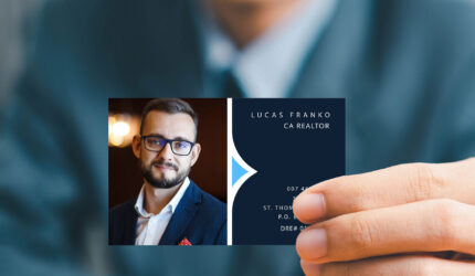 man holding business card