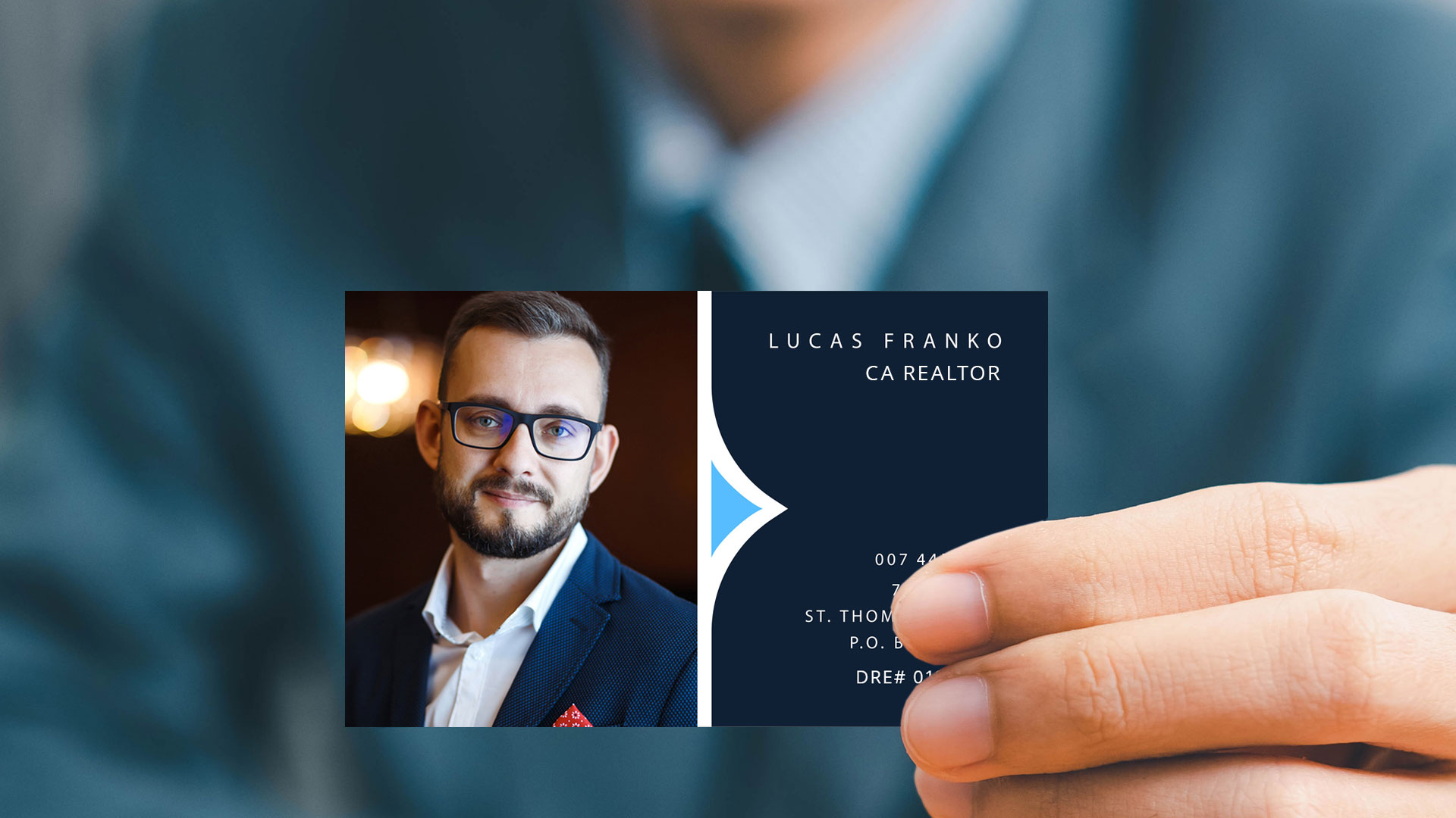 man holding business card