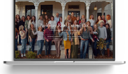 laptop on white background with real estate image